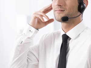 Call center man talks on headset
