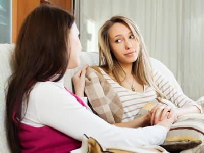 woman comforting a friend