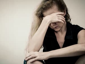 Depressed woman with binge eating disorder